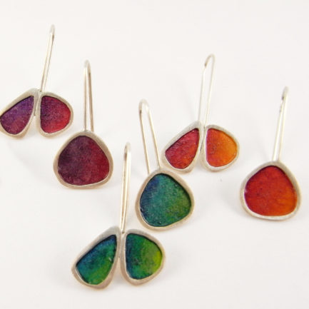Silver short asymmetrical earrings with coloured paper inlay