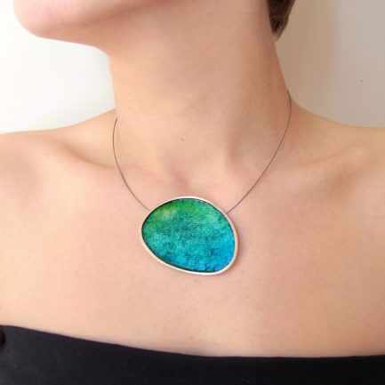 Silver statement necklace with coloured paper inlay