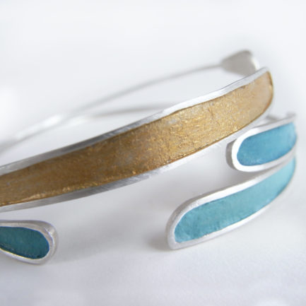 Silver two feather bracelet with coloured paper inlay