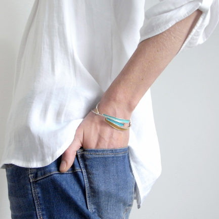 Silver two feather bracelet with coloured paper inlay