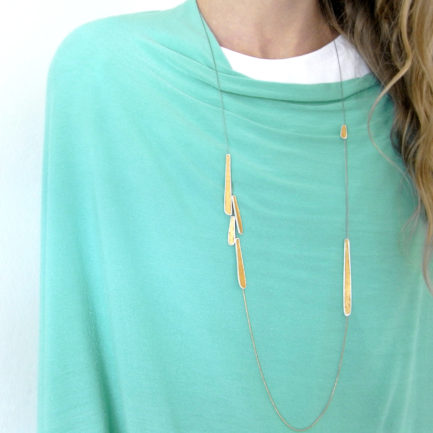 Silver feather-like long necklace with coloured paper inlay