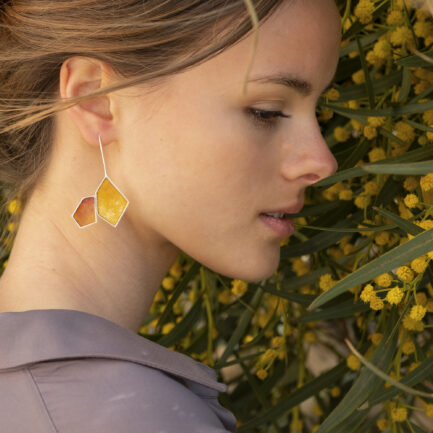 Silver rock-shaped long earrings with coloured paper inlay