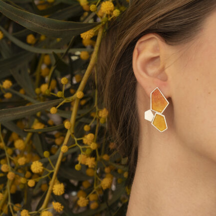 Silver rock-shaped large studs with coloured paper inlay