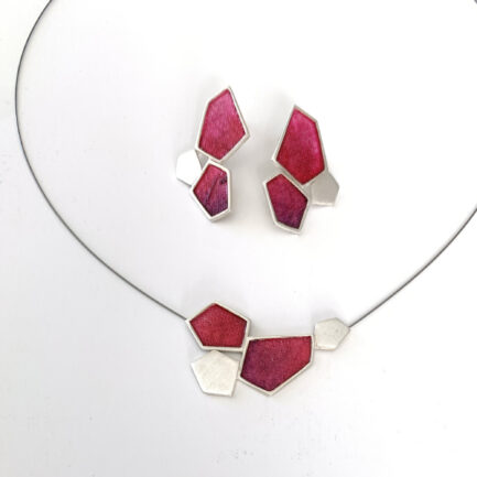 Silver rock-shaped necklace with coloured paper inlay