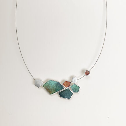 Silver rock-shaped statement necklace with coloured paper inlay